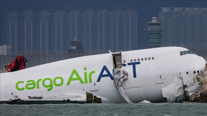 2 killed after cargo plane slides off runway in Hong Kong