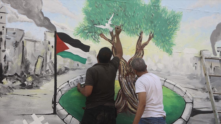 BM İklim Zirvesi sürerken, Gazze'de İsrail'in uyguladığı ekokırım duvar resmiyle anlatıldı