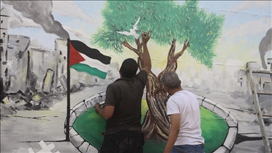 BM İklim Zirvesi sürerken, Gazze'de İsrail'in uyguladığı ekokırım duvar resmiyle anlatıldı