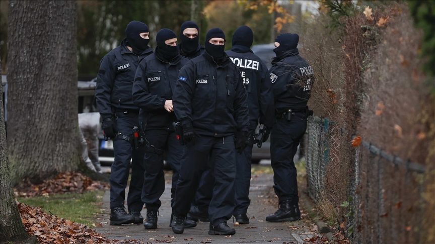 German police raid home of social media user over civil servant 'parasite' post