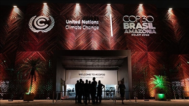 UN climate change conference delegates reach last-minute agreement, but it falls short of expectations