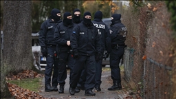 German police raid home of social media user over civil servant 'parasite' post