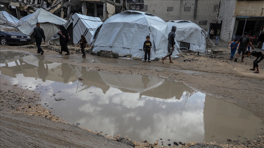 Dozens of tents for displaced Palestinians flooded by heavy rains in southern Gaza