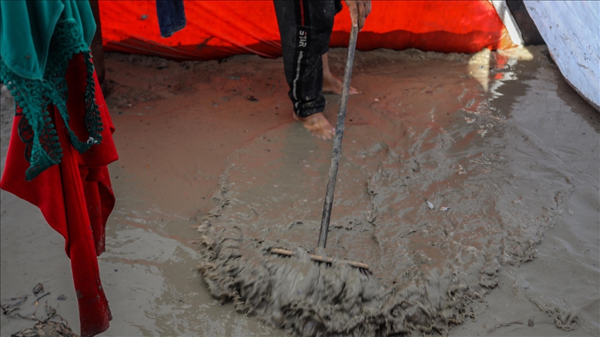Dozens of tents for displaced Palestinians flooded by heavy rains in southern Gaza