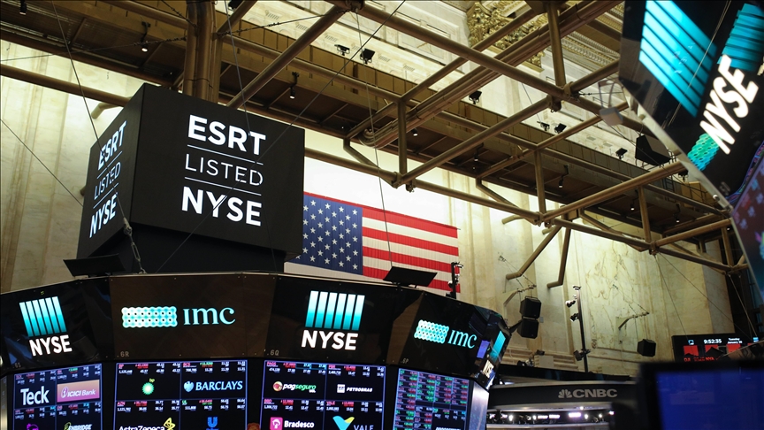 US stocks end with gains after Fed cuts rates again