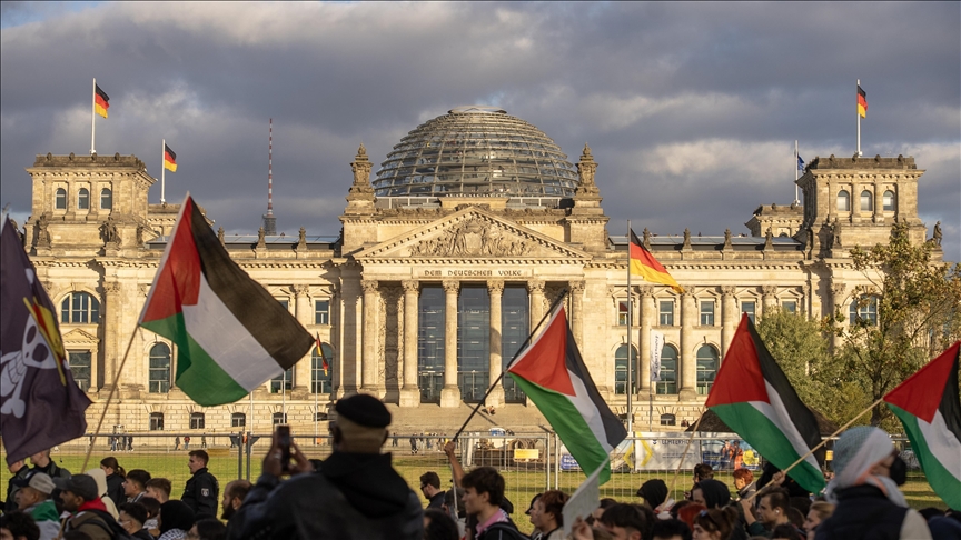 Berlin protesters hold torchlight march in solidarity with Palestinians