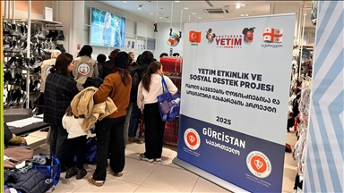 TDV'den Gürcistan'da 650 yetime giyim yardımı
