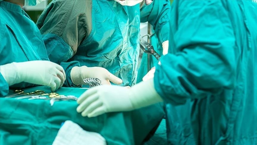 In 1st, Chinese surgeons graft patient’s torn-off ear onto her foot before putting it back in place