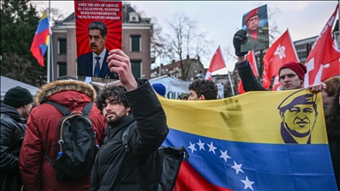 Demonstrators rally in Amsterdam against US military action in Venezuela
