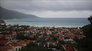 Fethiye'de sağanak sonrası Ölüdeniz'in rengi değişti