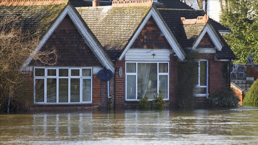 Hundreds of homes flooded as record rain hits UK