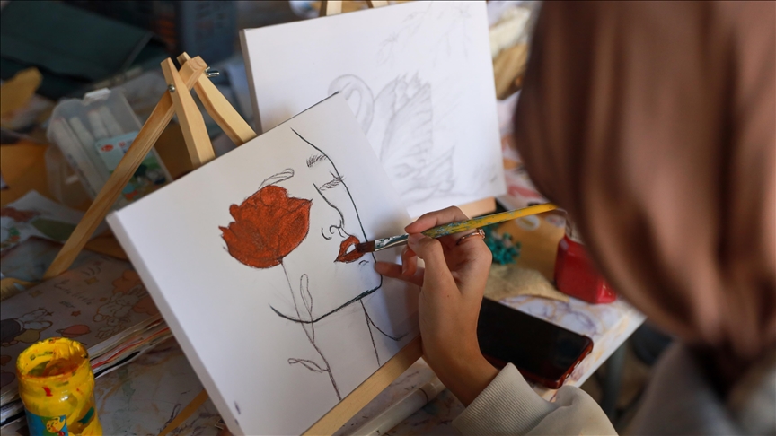 ‘Breathe and Paint’: Palestinian girls paint messages of hope on Gaza beach despite war fallout