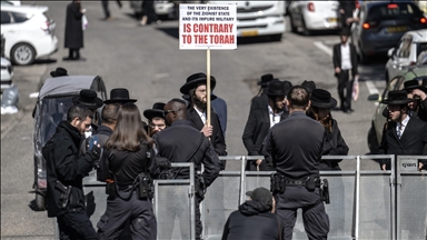 Ultra-Orthodox Jews protest mandatory military draft near west Jerusalem