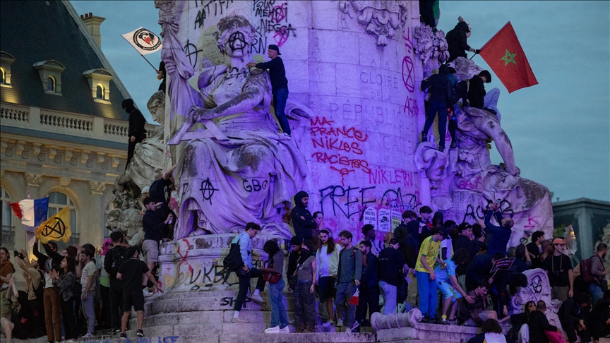 7 charged over killing of French activist in Lyon