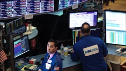 US stocks end mostly lower after volatile session as oil swings sharply