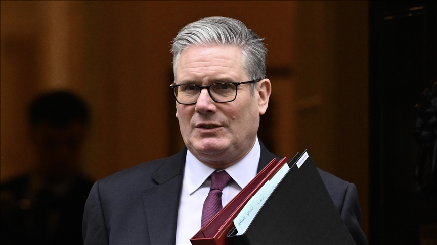 British premier warns UK faces 'war on 2 fronts'