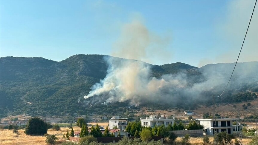Kaş'ta makilik alanda çıkan yangın söndürüldü