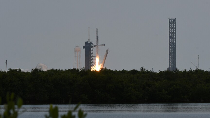 Japan launches world's first mission to collect samples from Martian moon