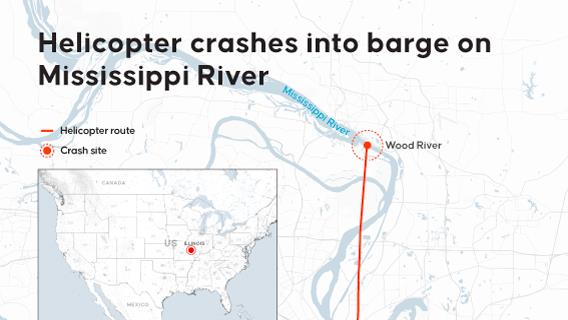 Helicopter crashes into barge on Mississippi River