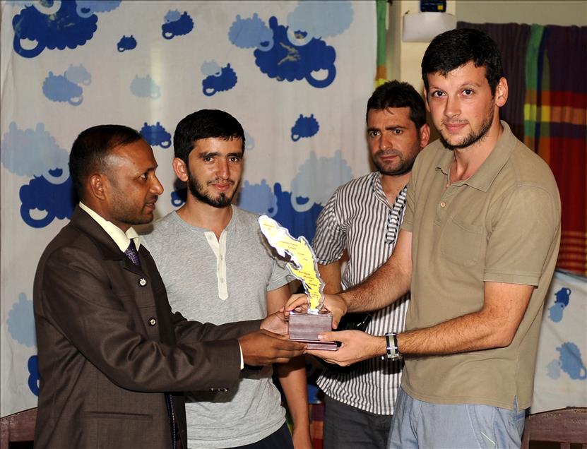 AA EKIBINE ARAKAN'DA PLAKET VERILDI