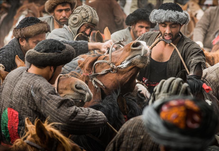 Afghan horsemen play Buzkashi
