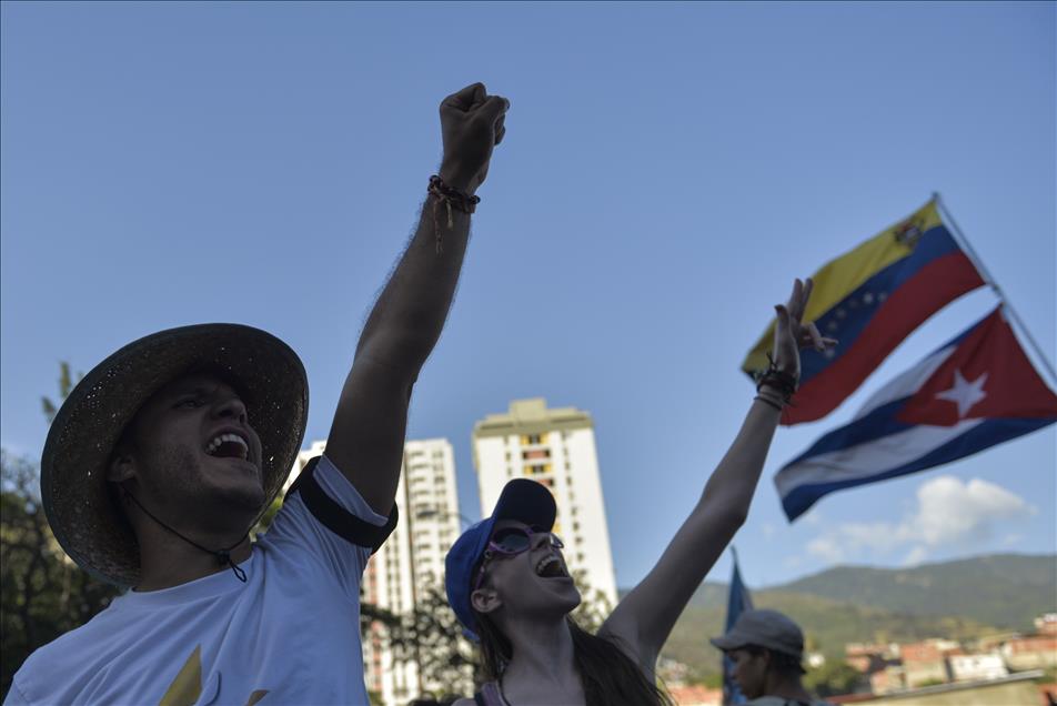 Venezuelans hold a parade on the 23rd anniversary of coup attempt in Caracas