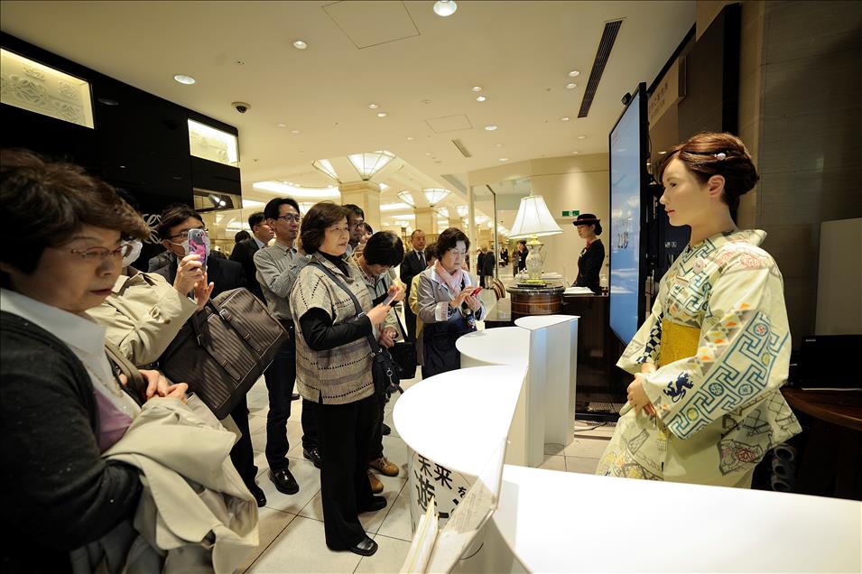 Humanoid robot starts working at a department store in Japan