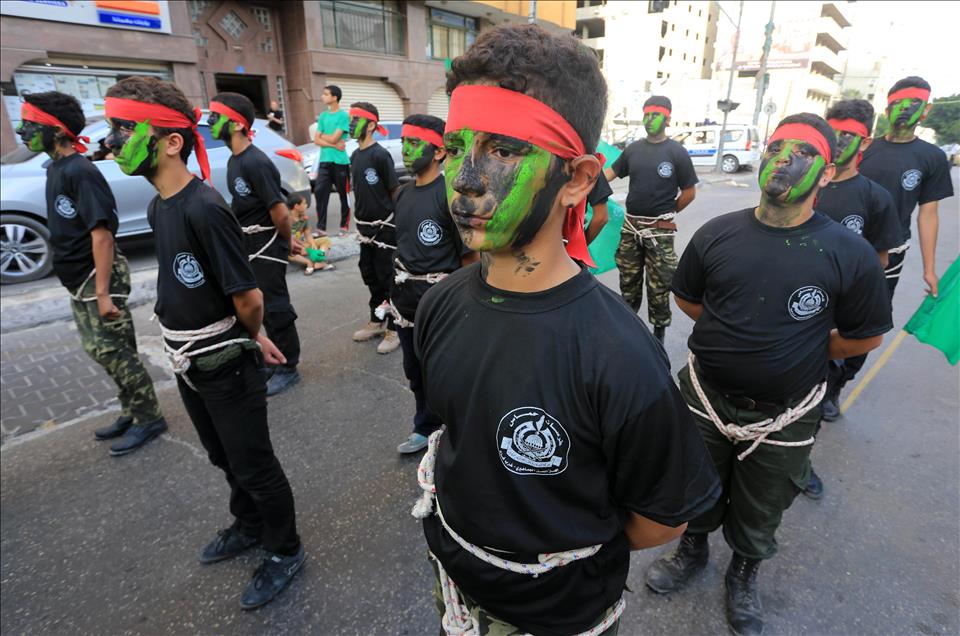 Palestinian boy scout stage a rally in Gaza