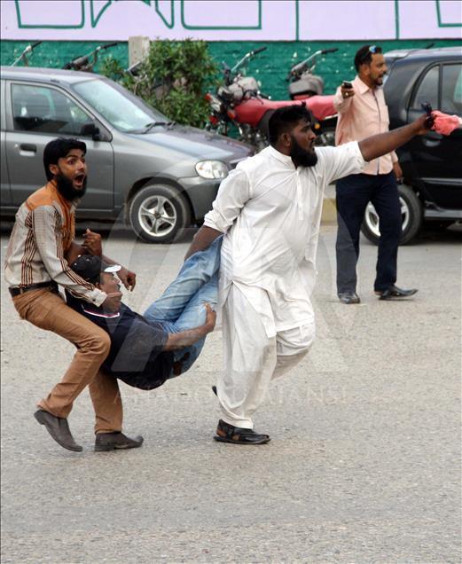 Muttahida Qaumi Movement members stage a protest in Karachi