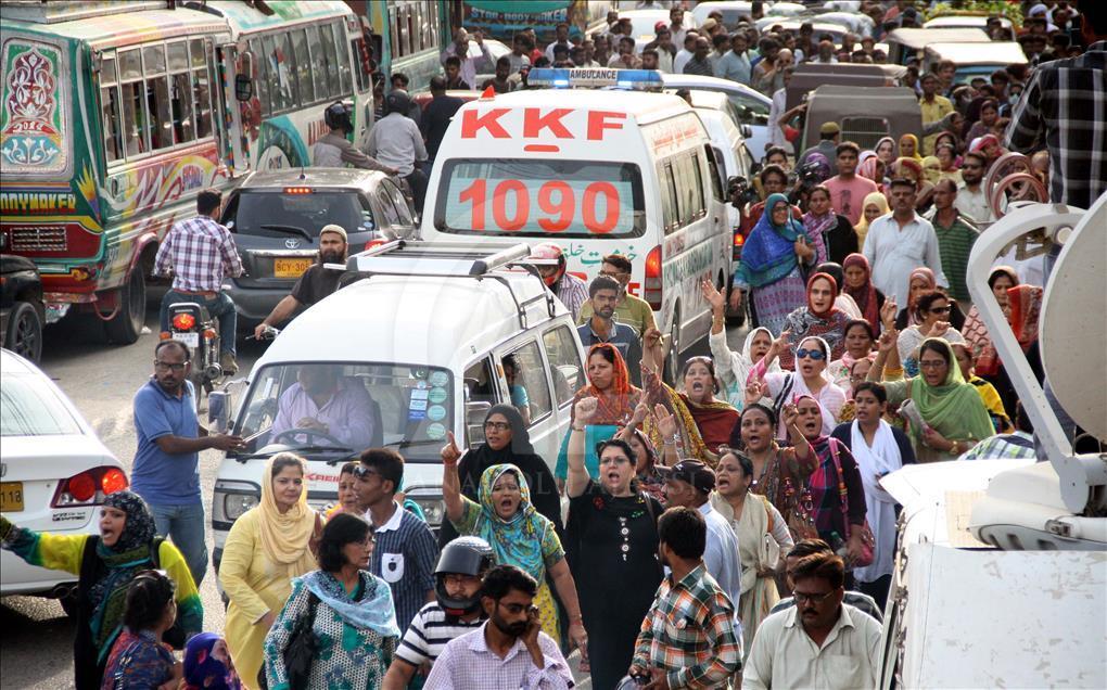 Muttahida Qaumi Movement members stage a protest in Karachi