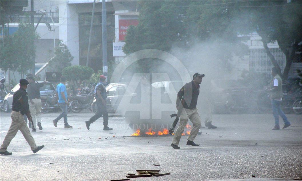 Muttahida Qaumi Movement members stage a protest in Karachi