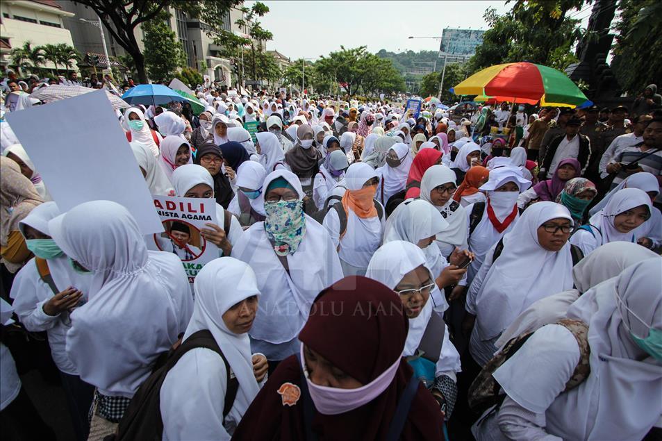 Thousands people from various Islamic organizations doing long march and demonstration in Semarang, Indonesia, on November 04, 2016 to show their disapproval for Governor Basuki Tjahaja Purnama, better known by his nickname 'Ahok', after the governors con