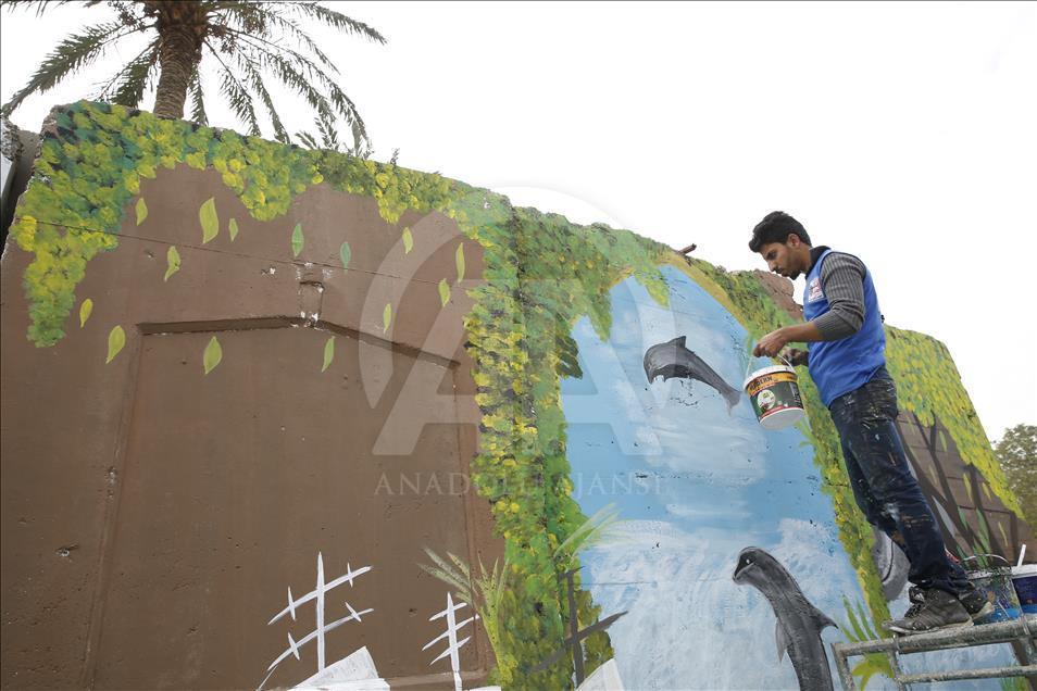 Irak'ta beton bariyerlerle "barış ve umut mesajları" veriliyor