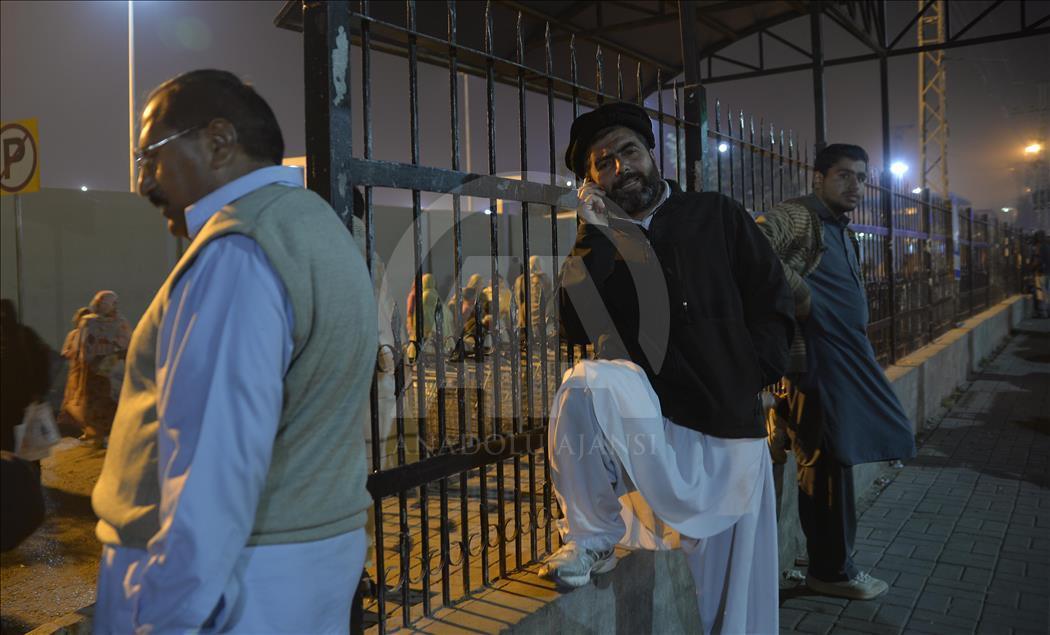 PIA Flight PK661 crash victims' relatives at the airport in Islamabad