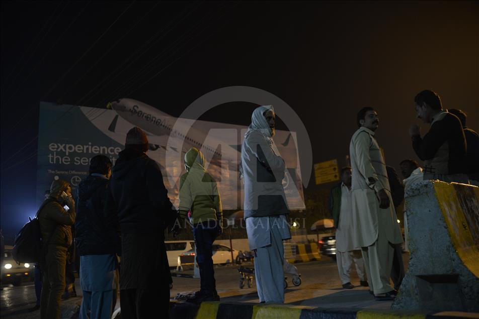 PIA Flight PK661 crash victims' relatives at the airport in Islamabad