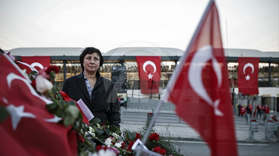 ISTANBUL, TURKEY - DECEMBER 11: People leave carnations and ligh