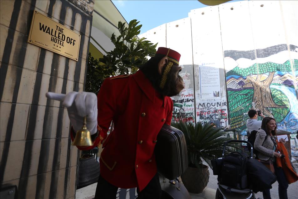 Street artist Banksy designs "The Walled Off" hotel in Bethlehem