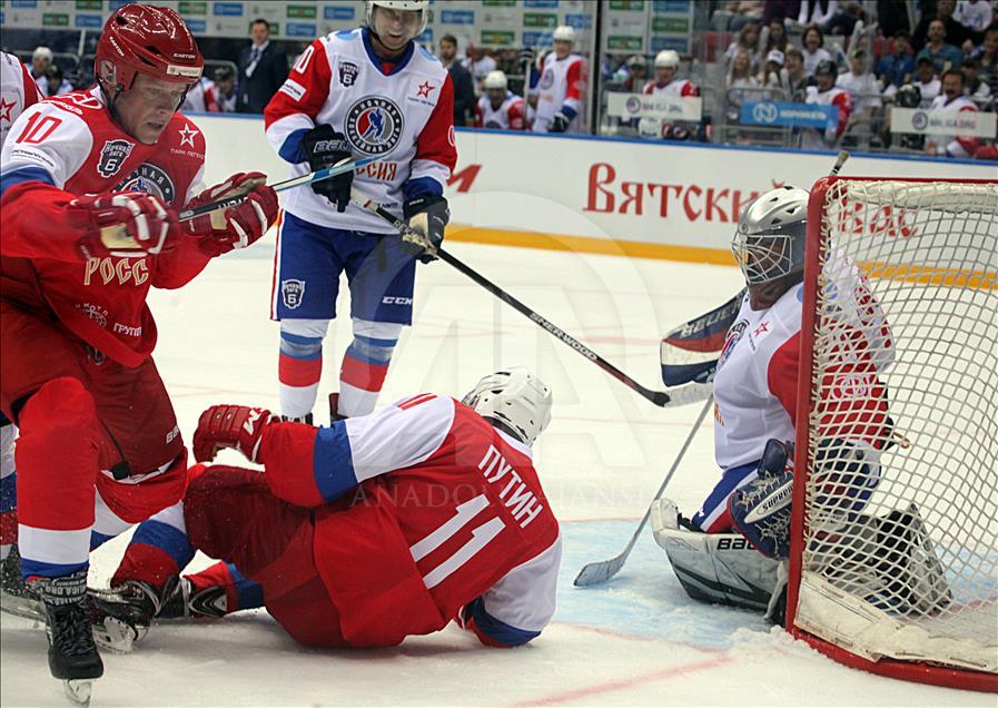 Russian President Vladimir Putin plays in ice hockey festival