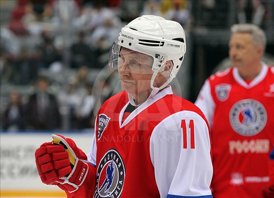 Russian President Vladimir Putin plays in ice hockey festival