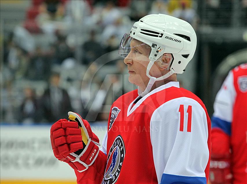 Russian President Vladimir Putin plays in ice hockey festival