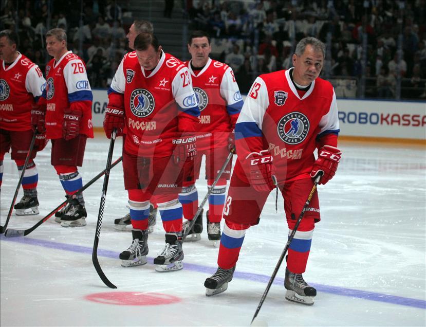 Russian President Vladimir Putin plays in ice hockey festival