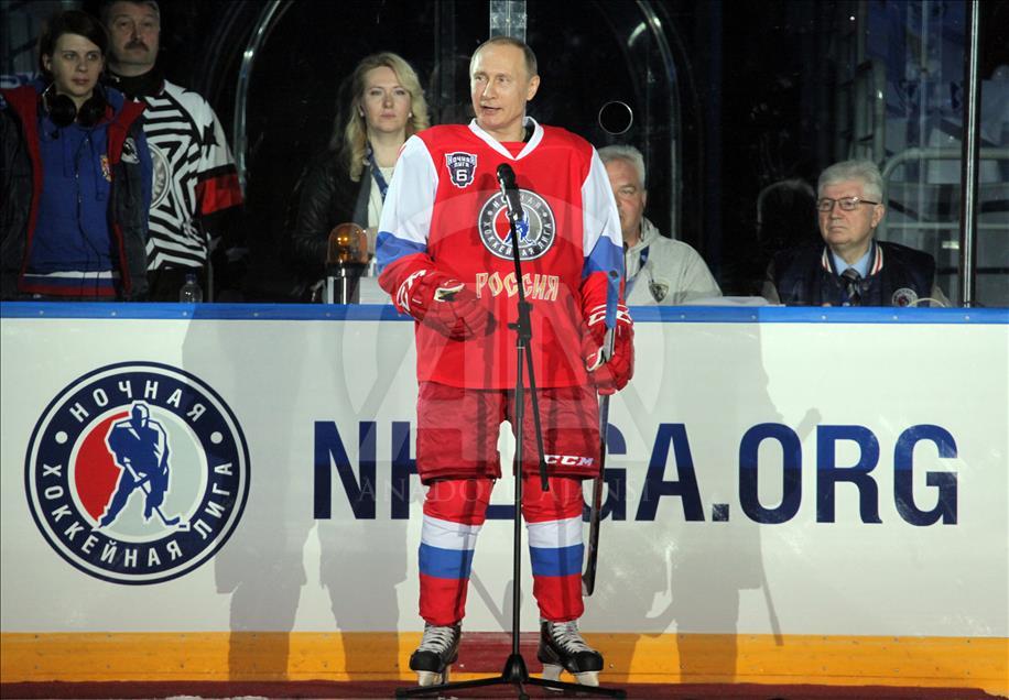Russian President Vladimir Putin plays in ice hockey festival
