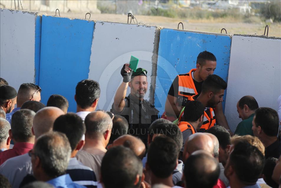 Passing through Qalandiya checkpoint for the second Friday prayer of Ramadan