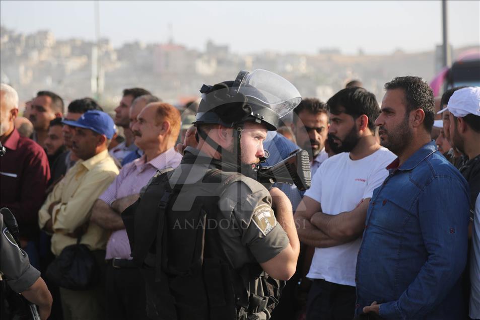 Passing through Qalandiya checkpoint for the second Friday prayer of Ramadan