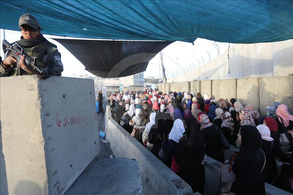Passing through Qalandiya checkpoint for the second Friday prayer of Ramadan