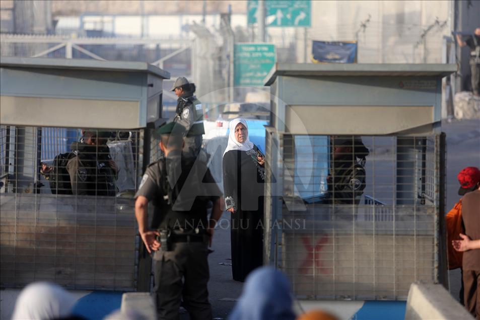 Passing through Qalandiya checkpoint for the second Friday prayer of Ramadan