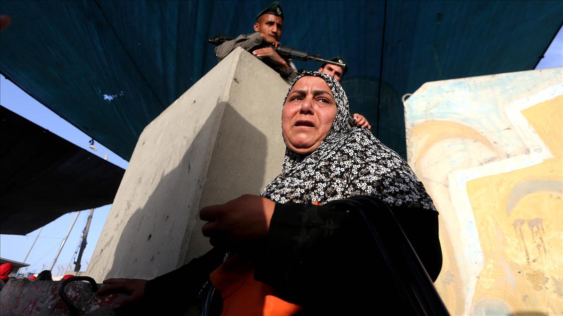 Passing through Qalandiya checkpoint for the second Friday prayer of Ramadan