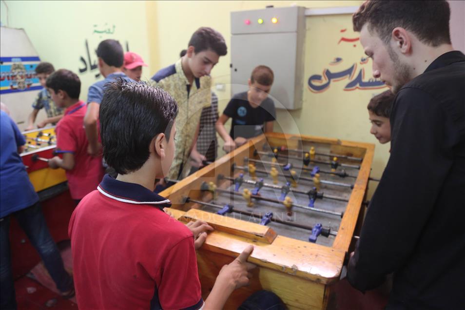 Syrian children at underground amusement park in Syria