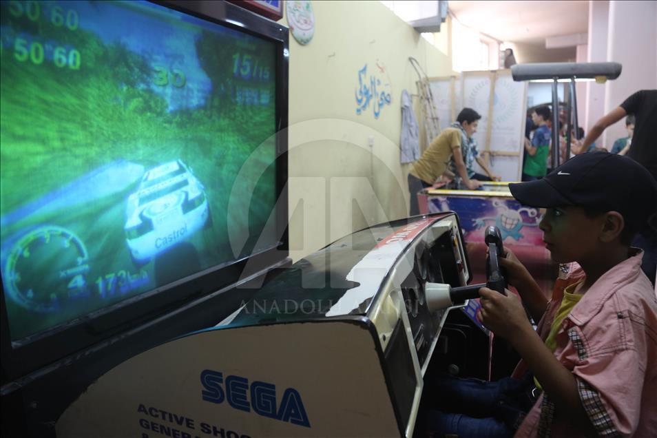 Syrian children at underground amusement park in Syria