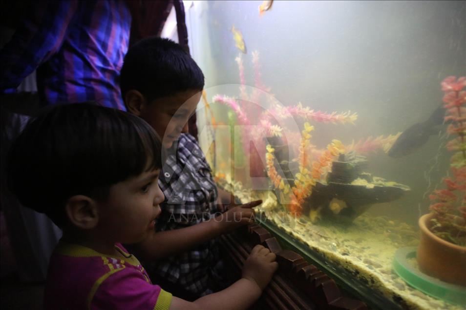 Syrian children at underground amusement park in Syria